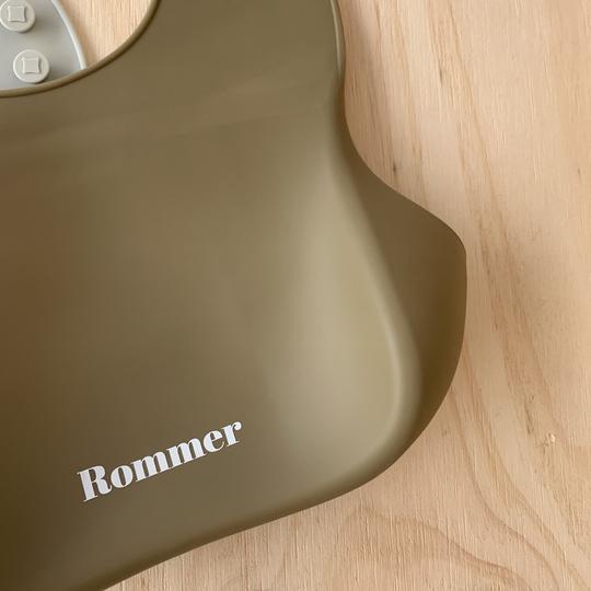 Rommer bibs are made from the softest silicone. They are both lightweight and durable. Rommer has updated the bib design to feature the reinforced button holes making them more resistant to tears.