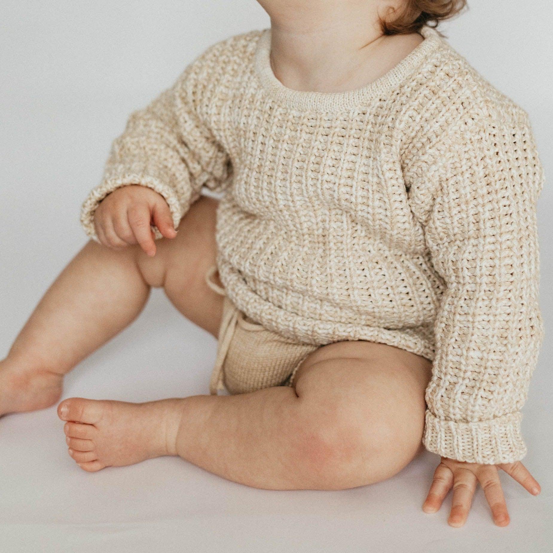 The Zoa knit is lovingly handmade using a loom which is a tool that is guided by the hand. 100% soft cotton, teardrop fastening at back with wood button. Good amount of stretch, considered true to size described as more ‘fitted’.
