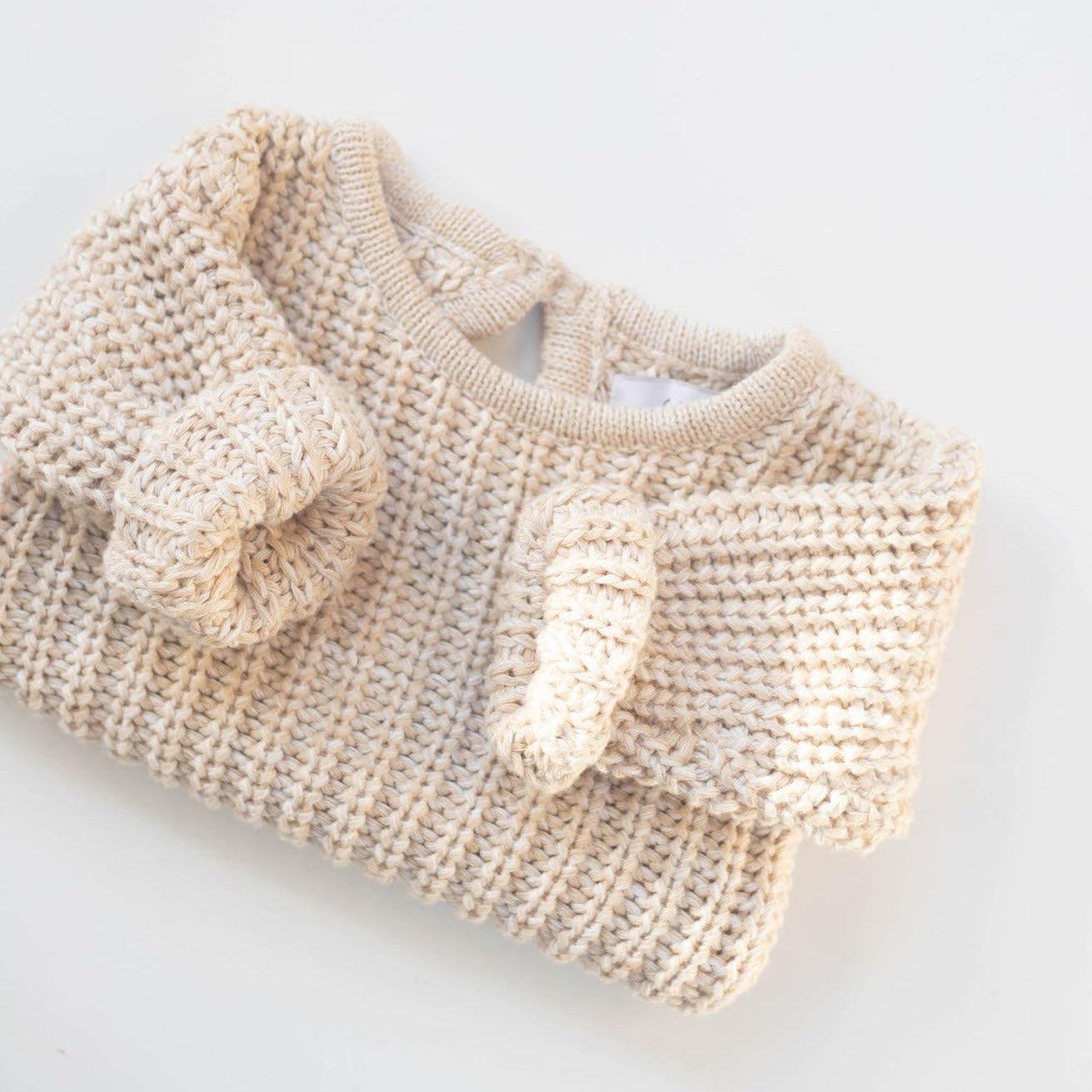 The Zoa knit is lovingly handmade using a loom which is a tool that is guided by the hand. 100% soft cotton, teardrop fastening at back with wood button. Good amount of stretch, considered true to size described as more ‘fitted’.