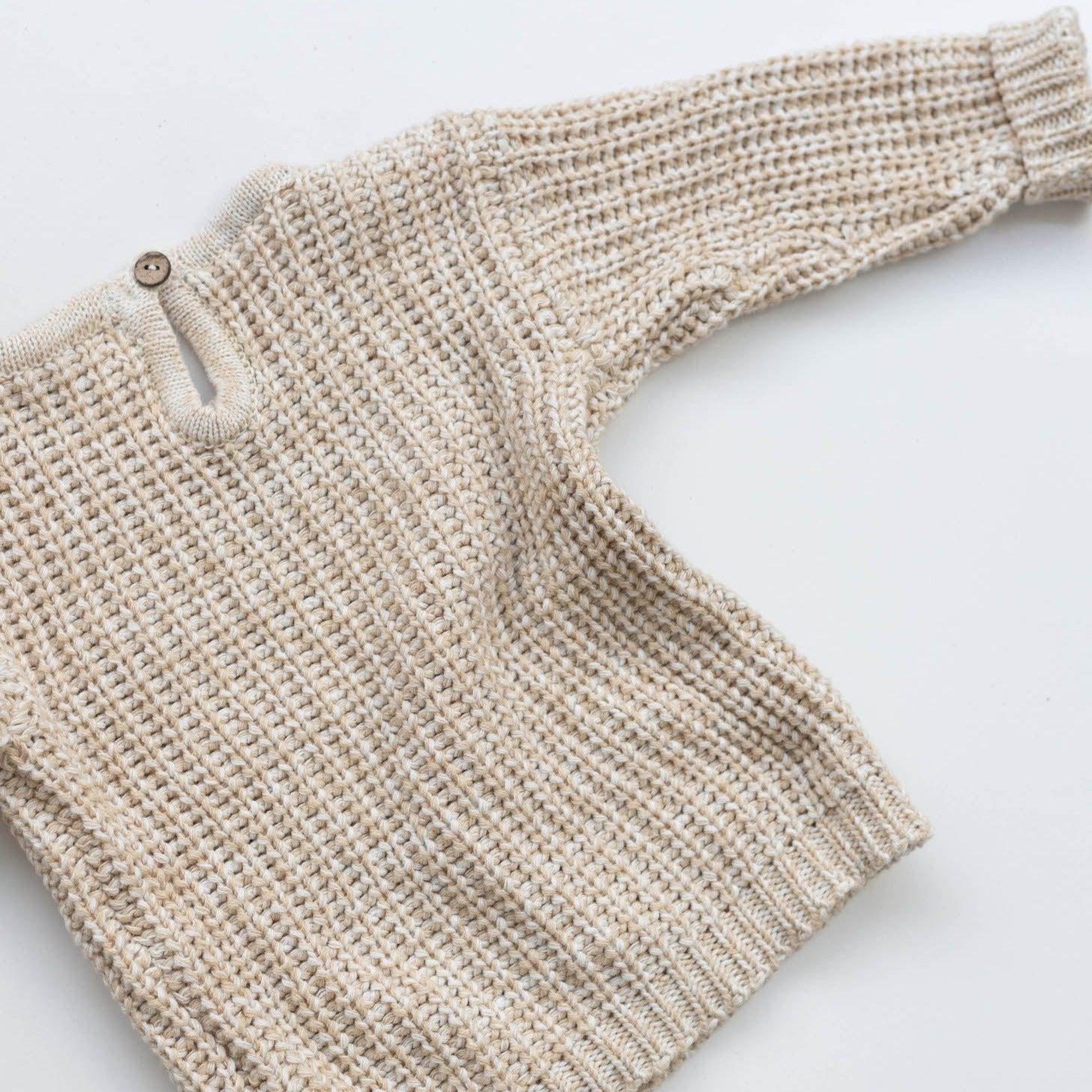 The Zoa knit is lovingly handmade using a loom which is a tool that is guided by the hand. 100% soft cotton, teardrop fastening at back with wood button. Good amount of stretch, considered true to size described as more ‘fitted’.