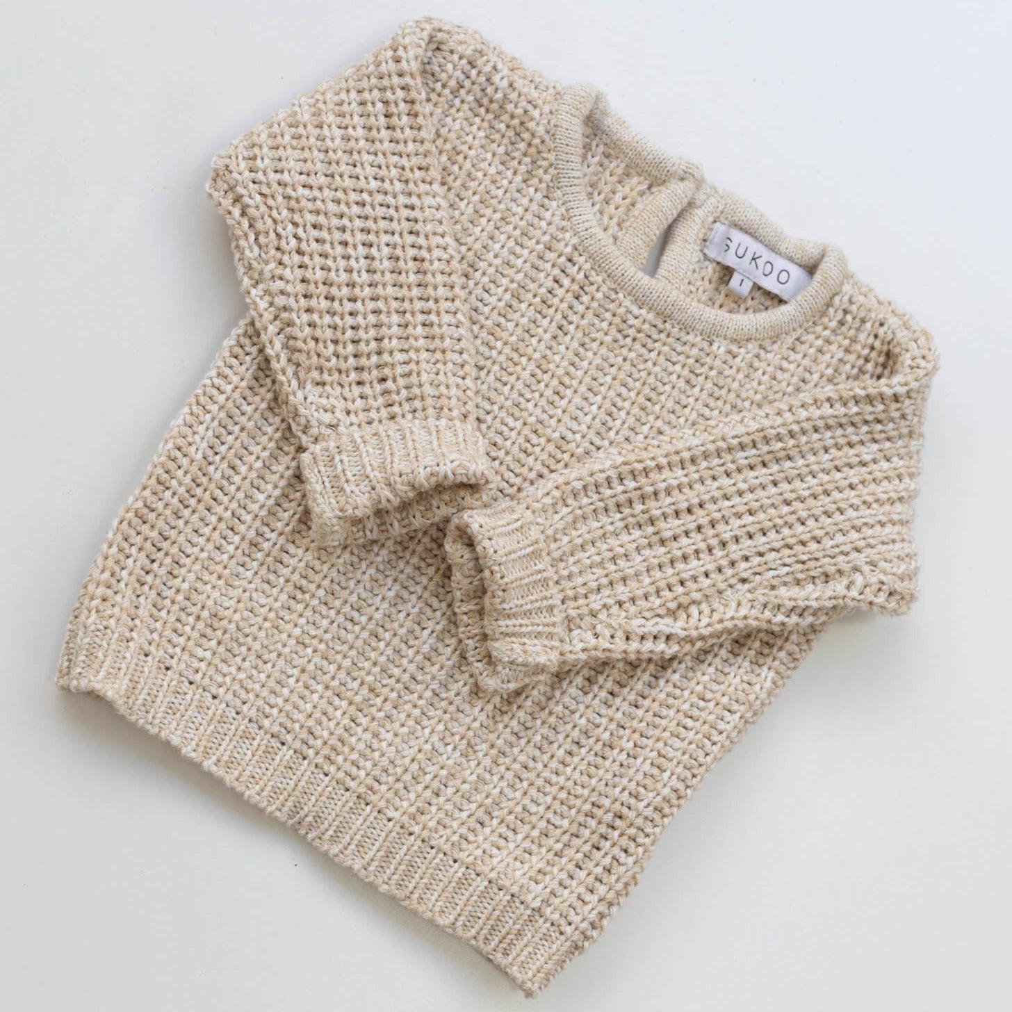 The Zoa knit is lovingly handmade using a loom which is a tool that is guided by the hand. 100% soft cotton, teardrop fastening at back with wood button. Good amount of stretch, considered true to size described as more ‘fitted’.