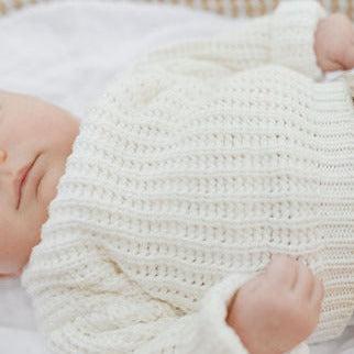 The Zoa knit is lovingly handmade using a loom which is a tool that is guided by the hand. 100% soft cotton, teardrop fastening at back with wood button. Good amount of stretch, considered true to size described as more ‘fitted’.