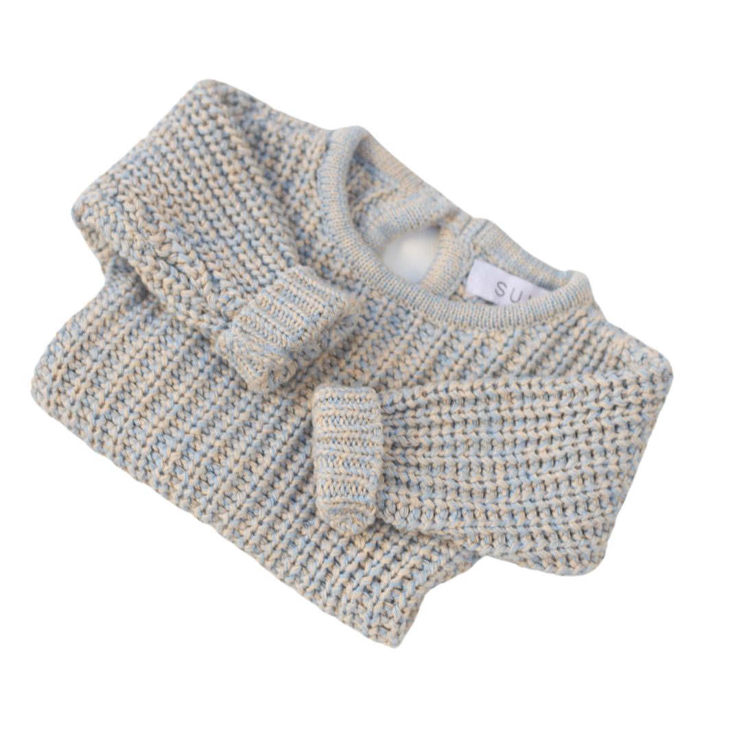 The Zoa knit is lovingly handmade using a loom which is a tool that is guided by the hand. 100% soft cotton, teardrop fastening at back with wood button. Good amount of stretch, considered true to size described as more ‘fitted’.