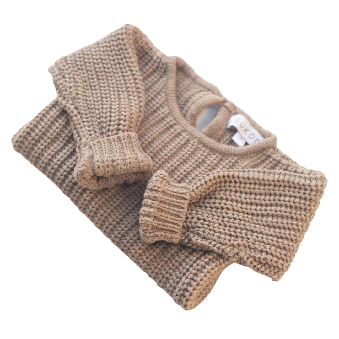 The Zoa knit is lovingly handmade using a loom which is a tool that is guided by the hand. 100% soft cotton, teardrop fastening at back with wood button. Good amount of stretch, considered true to size described as more ‘fitted’.