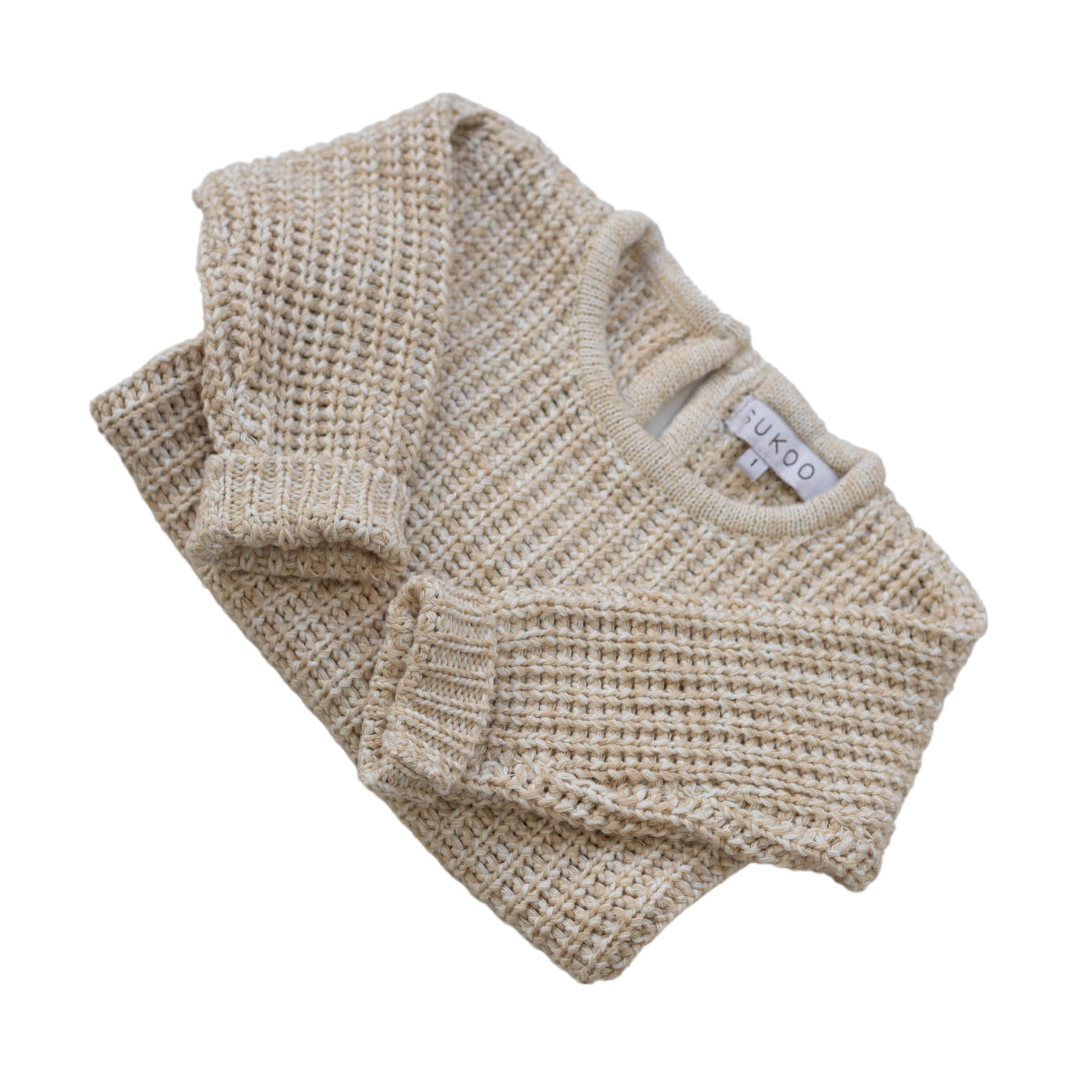 The Zoa knit is lovingly handmade using a loom which is a tool that is guided by the hand. 100% soft cotton, teardrop fastening at back with wood button. Good amount of stretch, considered true to size described as more ‘fitted’.